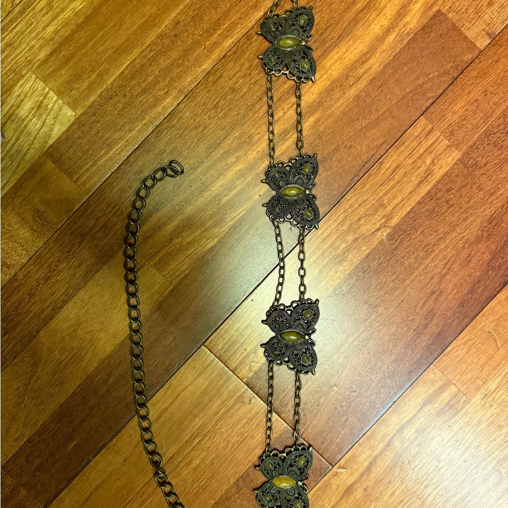 Adjustable metal design belt